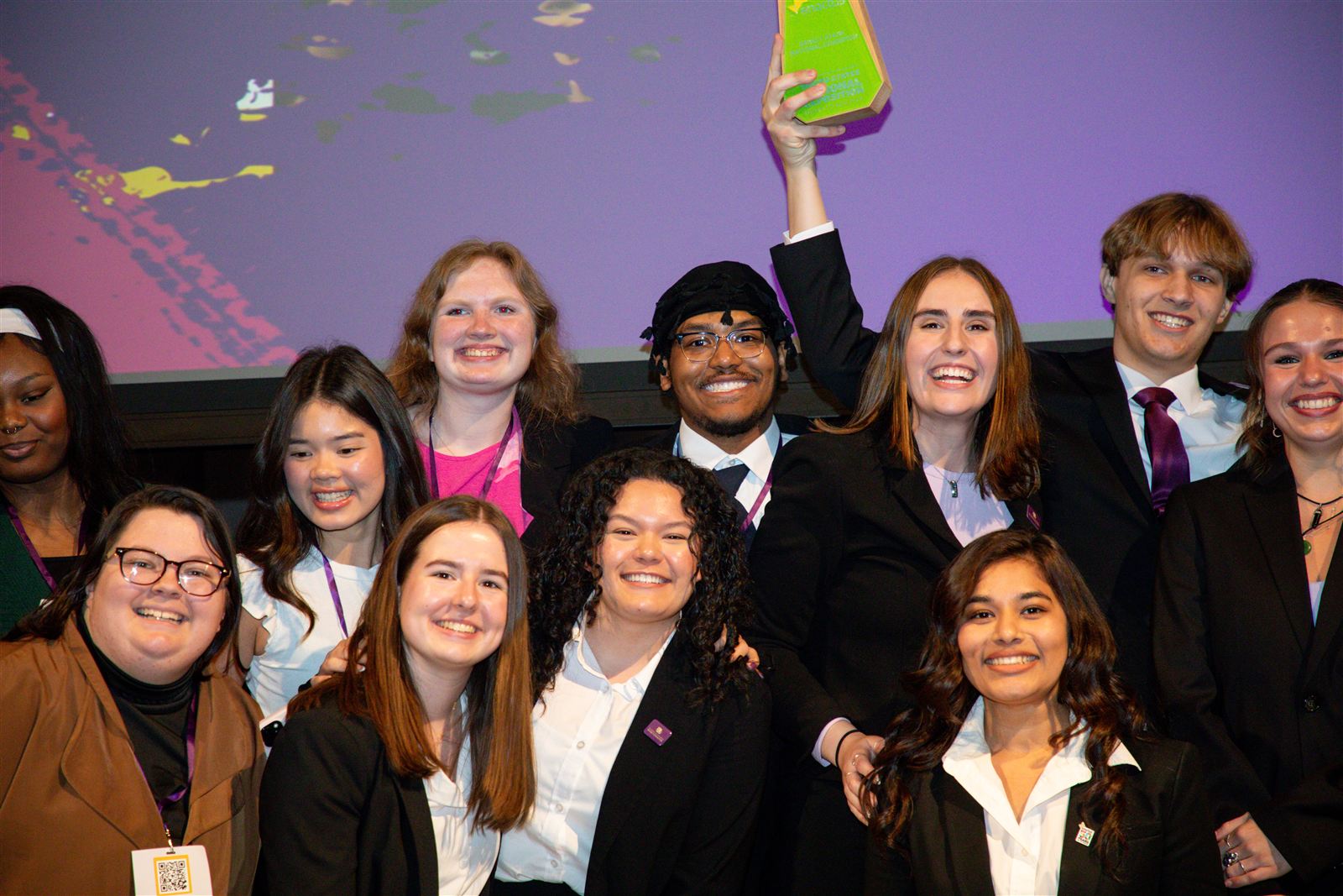 The UWW Enactus team celebrating with the national championship trophy